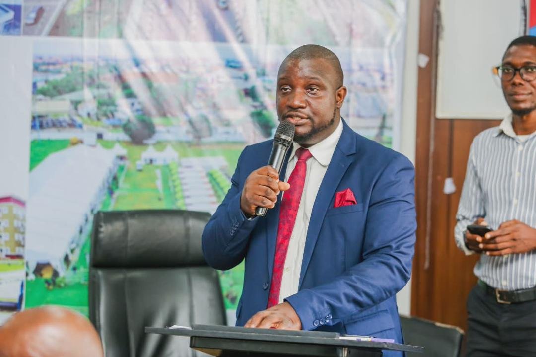 Abayomi presenting in a meeting room